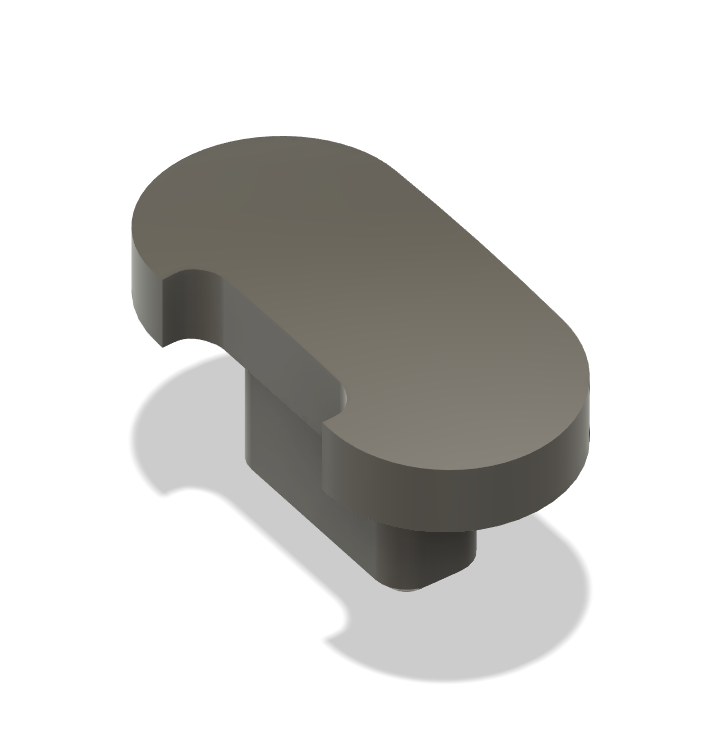 Isometric view of a gray, oval-shaped furniture connector cam lock.