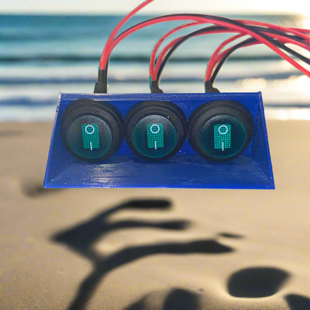 Blue triple rocker switch panel with red and black wires.