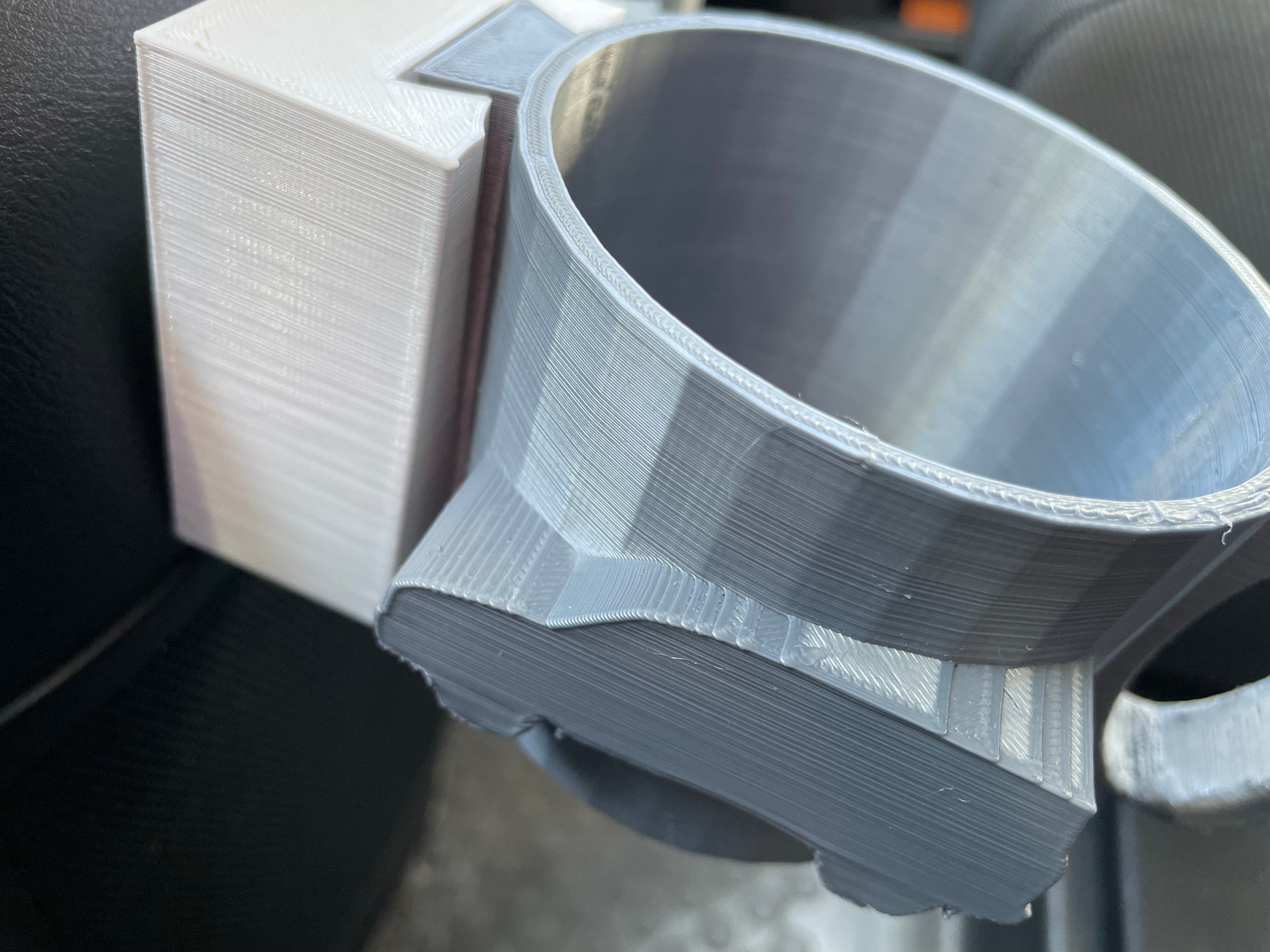 3D printed car cup holder insert, white and gray plastic