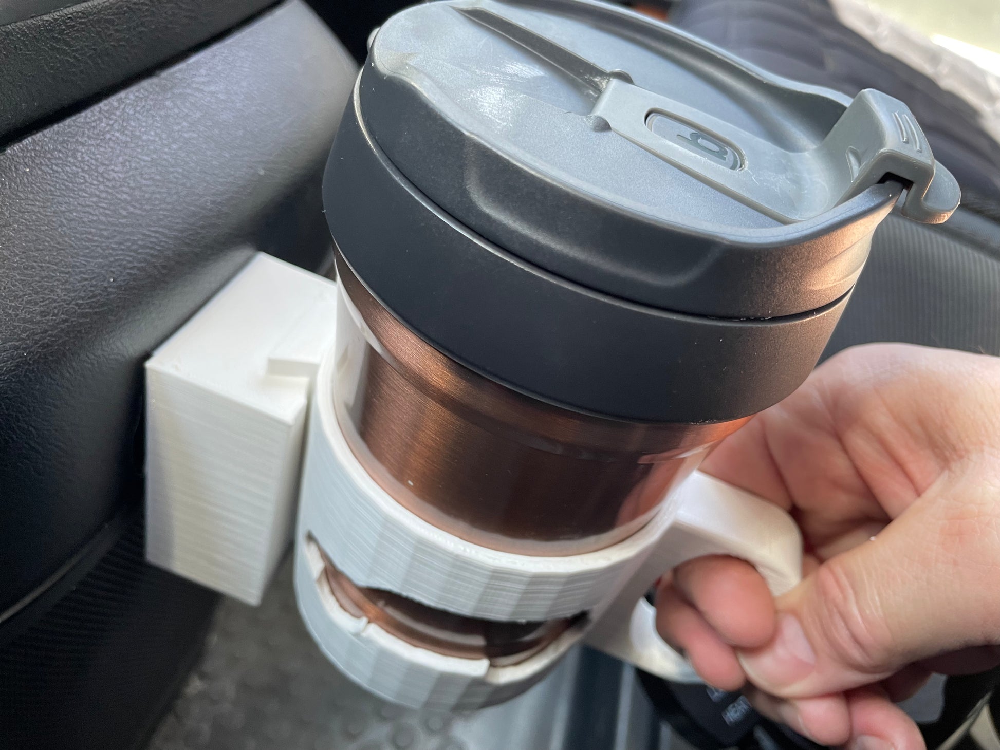 3D printed car cup holder adapter with insulated mug.