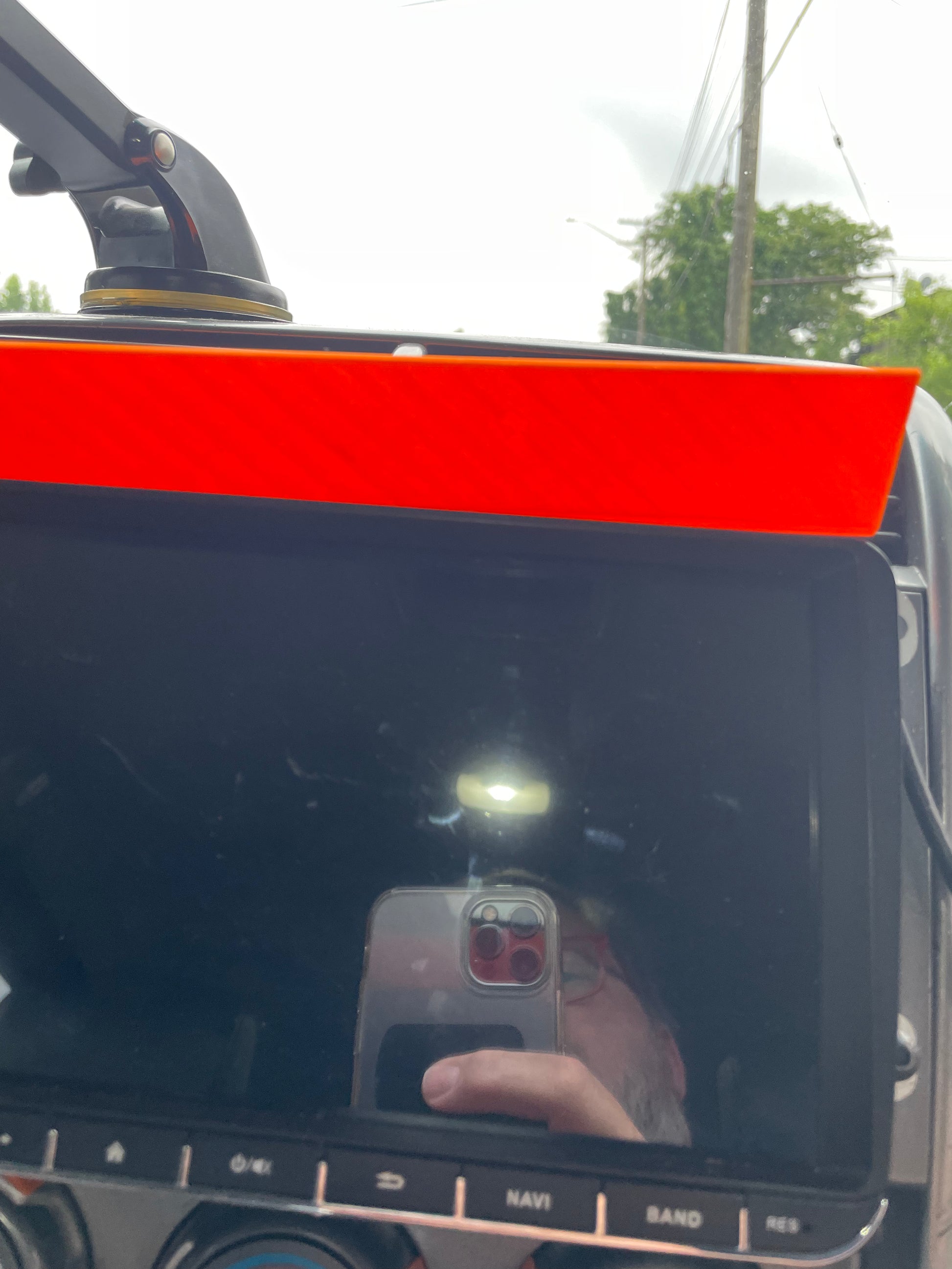 Dashboard view of the Alpine Halo9 car audio system with a large display screen.